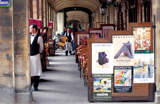 STOCK - Waiter standing at a restaurant in Paris, France, July 2001 (Keith Levit)